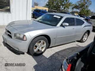 2010 Dodge Charger SXT с VIN 2B3CA3CV9AH107260, выставлен на аукционе Copart как лот 77408734 с пробегом Не указан миль и Списание • Salvage title. История ставок и продаж доступна на DreamBid. Изображение 1.