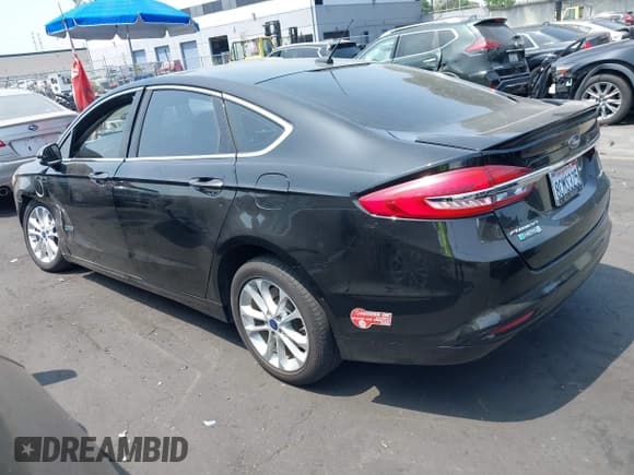 ✅ 2018 Ford Fusion Titanium • VIN: 3FA6P0SU3JR110585 • Lot: 42703340. Listed on IAAI with 113,723 mi. Free auction sales archive from the USA and detailed vehicle history report at DreamBid. Image 3.