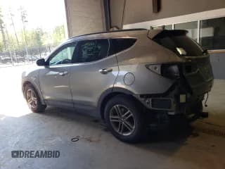 ✅ 2018 Hyundai Santa Fe 2.4L • VIN: 5XYZUDLBXJG532383 • Лот: 50864484. Опубликован ранее на Copart с пробегом 76 124 миль. Бесплатный доступ к архиву аукционных продаж из США и подробный отчёт об истории автомобиля на DreamBid. Изображение 2.