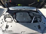 ✅ 2022 BMW 7 Series 740i • VIN: WBA7T2C07NCJ65222 • Lot: 42245847. Listed on IAAI with 52,047 mi. Free auction sales archive from the USA and detailed vehicle history report at DreamBid. Image 10.