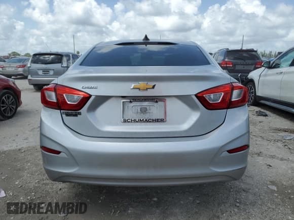 ✅ 2018 Chevrolet Cruze LS • VIN: 1G1BC5SM0J7103630 • Lot: 64805503. Listed on Copart with 124,430 mi. Free auction sales archive from the USA and detailed vehicle history report at DreamBid. Image 6.