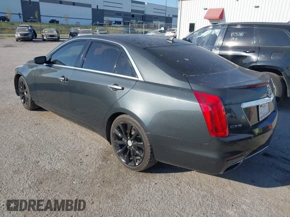 ✅ 2014 Cadillac CTS Luxury RWD • VIN: 1G6AR5SX5E0193905 • Lot: 43399010. Listed on IAAI with 115,555 mi. Free auction sales archive from the USA and detailed vehicle history report at DreamBid. Image 3.