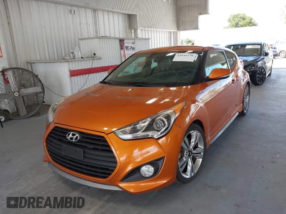 ✅ 2013 Hyundai Veloster Turbo • VIN: KMHTC6AE2DU178083 • Lot: 43039378. Wystawiony na IAAI z przebiegiem 126 260 mil. Bezpłatny archiwum sprzedaży aukcyjnych z USA i szczegółowy raport historii pojazdu na DreamBid. Zdjęcie 6.