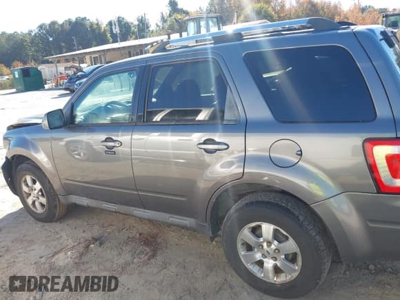 ✅ 2009 Ford Escape Limited • VIN: 1FMCU04G59KA18189 • Lot: 43590446. Listed on IAAI with 167,490 mi. Free auction sales archive from the USA and detailed vehicle history report at DreamBid. Image 14.