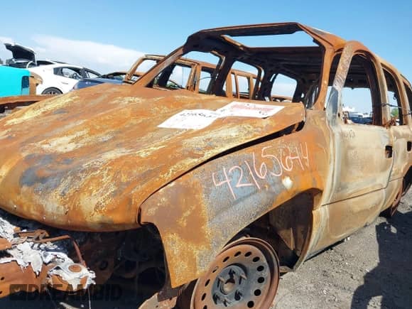 2005 Chevrolet Tahoe LT with VIN 1GNEC13T35R103223, listed as a IAAI auction lot 42165644 with Not provided miles and . Bid and sale history available at DreamBid. Image 12.