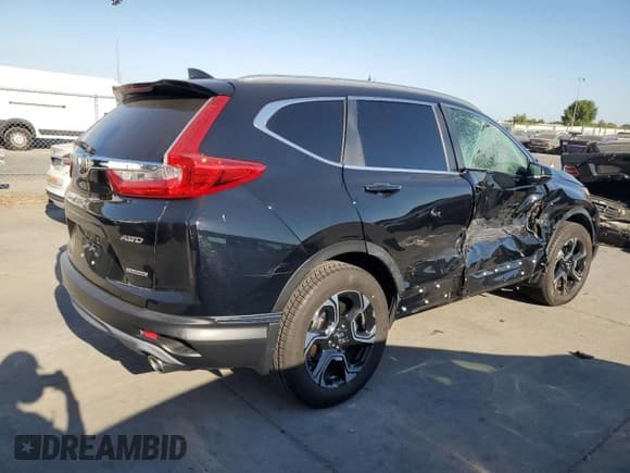 ✅ 2019 Honda CR-V Touring • VIN: 7FARW2H96KE024266 • Lot: 70161885. Wystawiony na Copart z przebiegiem 44 678 mil. Bezpłatny archiwum sprzedaży aukcyjnych z USA i szczegółowy raport historii pojazdu na DreamBid. Zdjęcie 3.