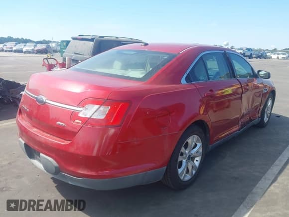 ✅ 2010 Ford Taurus SEL • VIN: 1FAHP2EW4AG151252 • Lot: 43296843. Listed on IAAI with 153,669 mi. Free auction sales archive from the USA and detailed vehicle history report at DreamBid. Image 4.