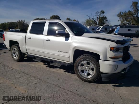 ✅ 2018 Chevrolet Silverado 1500 LT • VIN: 3GCUKREC7JG124119 • Lot: 89725465. Wystawiony na Copart z przebiegiem 111 091 mil. Bezpłatny archiwum sprzedaży aukcyjnych z USA i szczegółowy raport historii pojazdu na DreamBid. Zdjęcie 4.