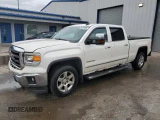 ✅ 2015 GMC Sierra 1500 SLT • VIN: 3GTU2VEC2FG248816 • Lot: 86277835. Listed on Copart with 117,494 mi. Free auction sales archive from the USA and detailed vehicle history report at DreamBid. Image 1.