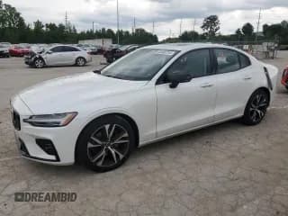 ✅ 2023 Volvo S60 Core Dark Theme • VIN: 7JRL12TK9PG239827 • Lot: 60460754. Listed on Copart with 21,511 mi. Free auction sales archive from the USA and detailed vehicle history report at DreamBid. Image 1.