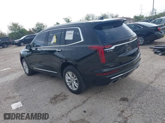 ✅ 2022 Cadillac XT6 Luxury • VIN: 1GYKPBR42NZ117730 • Lot: 43240068. Listed on IAAI with 56,043 mi. Free auction sales archive from the USA and detailed vehicle history report at DreamBid. Image 3.