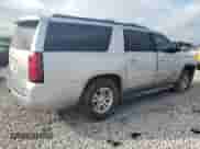 2015 Chevrolet Suburban LT with VIN 1GNSKJKC9FR147607, listed as a Copart auction lot 82344395 with 164,883 mi miles and Salvage title. Bid and sale history available at DreamBid. Image 3.