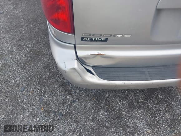 ✅ 2003 Dodge Caravan Sport • VIN: 2D4GP44393R240344 • Lot: 42999999. Listed on IAAI with 163,419 mi. Free auction sales archive from the USA and detailed vehicle history report at DreamBid. Image 6.