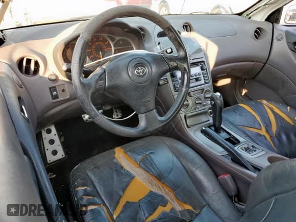 ✅ 2000 Toyota Celica GTS • VIN: JTDDY32T0Y0023745 • Лот: 80243415. Опубликован ранее на Copart с пробегом 190 506 миль. Бесплатный доступ к архиву аукционных продаж из США и подробный отчёт об истории автомобиля на DreamBid. Изображение 8.