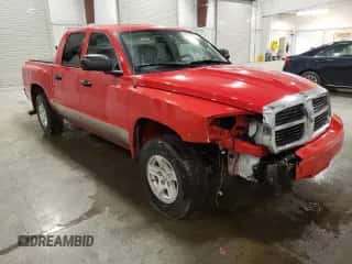 2006 Dodge Dakota SLT с VIN 1D7HW48N76S589897, выставлен на аукционе Copart как лот 80532214 с пробегом 139 395 миль миль и Списание • Salvage title. История ставок и продаж доступна на DreamBid. Изображение 4.