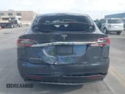 ✅ 2017 Tesla Model X 90D • VIN: 5YJXCAE22HF076094 • Lot: 43214619. Listed on IAAI with 150,608 mi. Free auction sales archive from the USA and detailed vehicle history report at DreamBid. Image 15.