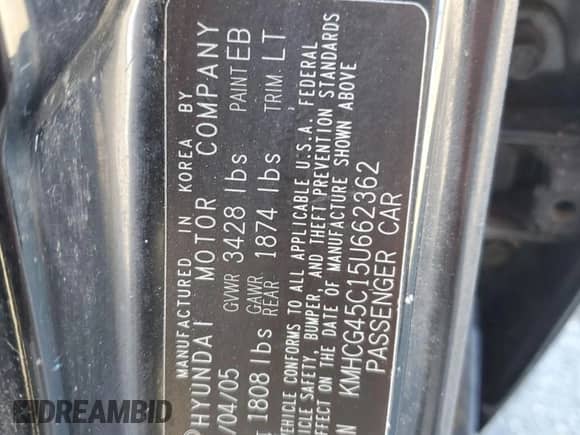 2005 Hyundai Accent GLS with VIN KMHCG45C15U662362, listed as a Copart auction lot 80574774 with 122,898 mi miles and Salvage title. Bid and sale history available at DreamBid. Image 14.