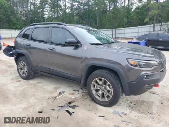 ✅ 2022 Jeep Cherokee Trailhawk • VIN: 1C4PJMBX1ND529146 • Lot: 56237365. Listed on Copart with 26,718 mi. Free auction sales archive from the USA and detailed vehicle history report at DreamBid. Image 4.
