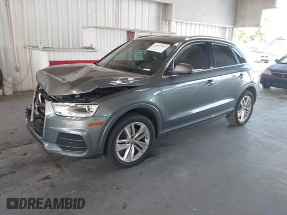 ✅ 2016 Audi Q3 Premium Plus • VIN: WA1EFCFS1GR019977 • Lot: 43667587. Listed on IAAI with 138,184 mi. Free auction sales archive from the USA and detailed vehicle history report at DreamBid. Image 2.