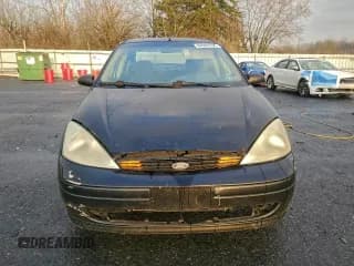 ✅ 2000 Ford Focus SE • VIN: 1FAFP34P6YW329511 • Lot: 94960755. Wystawiony na Copart z przebiegiem 214 352 mil. Bezpłatny archiwum sprzedaży aukcyjnych z USA i szczegółowy raport historii pojazdu na DreamBid. Zdjęcie 5.