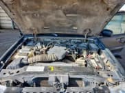 ✅ 2003 Ford Explorer Sport Trac XLS • VIN: 1FMZU67E33UA41036 • Lot: 86667165. Wystawiony na Copart z przebiegiem 221 484 mil. Bezpłatny archiwum sprzedaży aukcyjnych z USA i szczegółowy raport historii pojazdu na DreamBid. Zdjęcie 11.