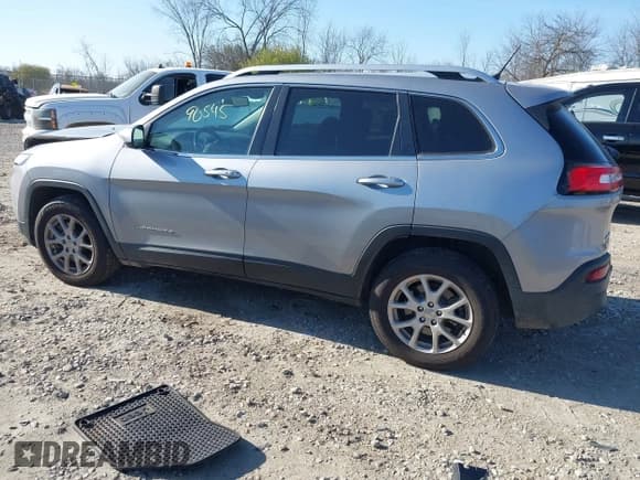✅ 2014 Jeep Cherokee Latitude • VIN: 1C4PJMCS5EW272600 • Lot: 43690545. Listed on IAAI with 116,682 mi. Free auction sales archive from the USA and detailed vehicle history report at DreamBid. Image 3.