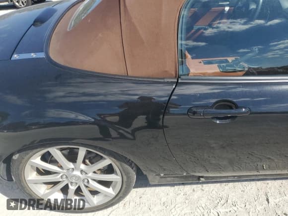 ✅ 2006 Mazda MX-5 Miata Grand Touring • VIN: JM1NC25F660101087 • Lot: 91472985. Wystawiony na Copart z przebiegiem 54 683 mil. Bezpłatny archiwum sprzedaży aukcyjnych z USA i szczegółowy raport historii pojazdu na DreamBid. Zdjęcie 10.