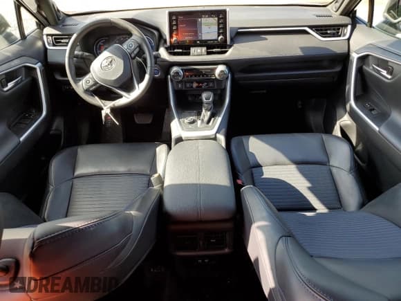 ✅ 2019 Toyota RAV4 Hybrid XSE • VIN: 2T3EWRFV0KW030853 • Lot: 82676905. Listed on Copart with 68,984 mi. Free auction sales archive from the USA and detailed vehicle history report at DreamBid. Image 8.