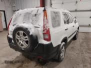 ✅ 2003 Honda CR-V EX • VIN: JHLRD78833C018237 • Лот: 43847469. Опубликован ранее на IAAI с пробегом 248 253 миль. Бесплатный доступ к архиву аукционных продаж из США и подробный отчёт об истории автомобиля на DreamBid. Изображение 4.