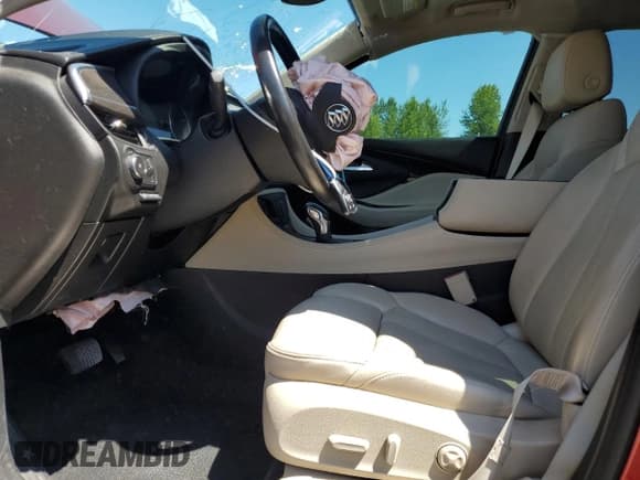 ✅ 2020 Buick Envision Premium II • VIN: LRBFX4SX5LD103627 • Лот: 64050825. Опубликован ранее на Copart с пробегом 59 760 миль. Бесплатный доступ к архиву аукционных продаж из США и подробный отчёт об истории автомобиля на DreamBid. Изображение 7.