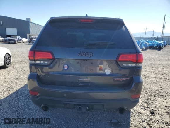 2018 Jeep Grand Cherokee Trailhawk с VIN 1C4RJFLT9JC122630, выставлен на аукционе Copart как лот 81750945 с пробегом 200 960 миль миль и Списание • Salvage title. История ставок и продаж доступна на DreamBid. Изображение 6.