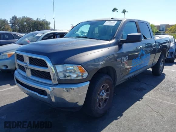 ✅ 2016 Ram 2500 SLT • VIN: 3C6TR4DT3GG390555 • Lot: 42894111. Listed on IAAI with 233,298 mi. Free auction sales archive from the USA and detailed vehicle history report at DreamBid. Image 2.