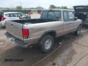 ✅ 1996 Mazda B-Series • VIN: 4F4CR17X1TTM05189 • Lot: 42009381. Wystawiony na IAAI z przebiegiem 127 675 mil. Bezpłatny archiwum sprzedaży aukcyjnych z USA i szczegółowy raport historii pojazdu na DreamBid. Zdjęcie 4.