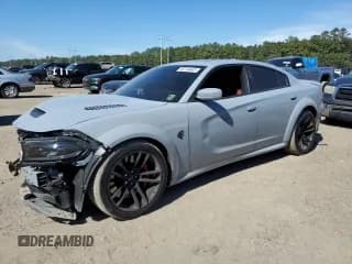 ✅ 2022 Dodge Charger SRT Hellcat Widebody • VIN: 2C3CDXL98NH210518 • Лот: 82744645. Опубликован ранее на Copart с пробегом 30 521 миль. Бесплатный доступ к архиву аукционных продаж из США и подробный отчёт об истории автомобиля на DreamBid. Изображение 1.