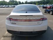 ✅ 2017 Lincoln MKZ Select • VIN: 3LN6L5C9XHR615171 • Lot: 68125235. Listed on Copart with 137,575 mi. Free auction sales archive from the USA and detailed vehicle history report at DreamBid. Image 6.
