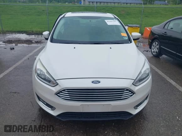 ✅ 2016 Ford Focus Titanium • VIN: 1FADP3N26GL387872 • Lot: 42183397. Listed on IAAI with 30,557 mi. Free auction sales archive from the USA and detailed vehicle history report at DreamBid. Image 12.