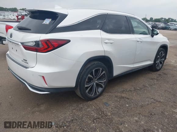 ✅ 2018 Lexus RX 350L Premium • VIN: JTJGZKCAXJ2003303 • Лот: 42159144. Опубликован ранее на IAAI с пробегом 105 147 миль. Бесплатный доступ к архиву аукционных продаж из США и подробный отчёт об истории автомобиля на DreamBid. Изображение 4.
