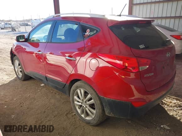 2010 Hyundai Tucson GLS with VIN KM8JUCAC8AU057801, listed as a IAAI auction lot 41037140 with 115,529 mi miles and . Bid and sale history available at DreamBid. Image 3.