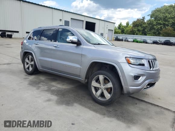 ✅ 2014 Jeep Grand Cherokee Overland • VIN: 1C4RJFCG5EC210163 • Lot: 68894775. Listed on Copart with 205,339 mi. Free auction sales archive from the USA and detailed vehicle history report at DreamBid. Image 4.