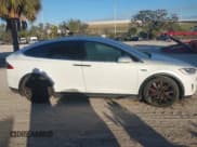 ✅ 2016 Tesla Model X P90D • VIN: 5YJXCAE46GF013368 • Lot: 41340440. Listed on IAAI with Not provided. Free auction sales archive from the USA and detailed vehicle history report at DreamBid. Image 13.