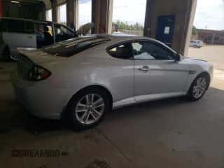 2007 Hyundai Tiburon GS с VIN KMHHM66D37U253610, выставлен на аукционе Copart как лот 62200825 с пробегом 107 500 миль миль и Списание • Salvage title. История ставок и продаж доступна на DreamBid. Изображение 3.