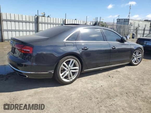 ✅ 2015 Audi A8 4.0T • VIN: WAU32AFD4FN026956 • Lot: 65777325. Wystawiony na Copart z przebiegiem 141 669 mil. Bezpłatny archiwum sprzedaży aukcyjnych z USA i szczegółowy raport historii pojazdu na DreamBid. Zdjęcie 3.