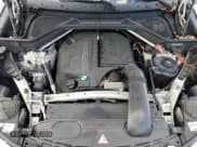 ✅ 2014 BMW X5 sDrive35i • VIN: 5UXKR2C57E0H31454 • Lot: 85766785. Listed on Copart with 137,394 mi. Free auction sales archive from the USA and detailed vehicle history report at DreamBid. Image 12.