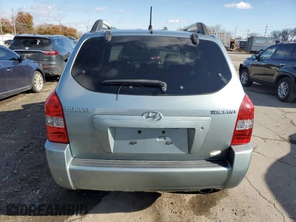 2005 Hyundai Tucson GL z VIN KM8JM12B55U119266, wystawiony jako Copart lot #79095984 z przebiegiem 114 939 mil mil oraz Szkoda całkowita • Salvage title. Historia ofert i sprzedaży dostępna na DreamBid. Obrazek 6.