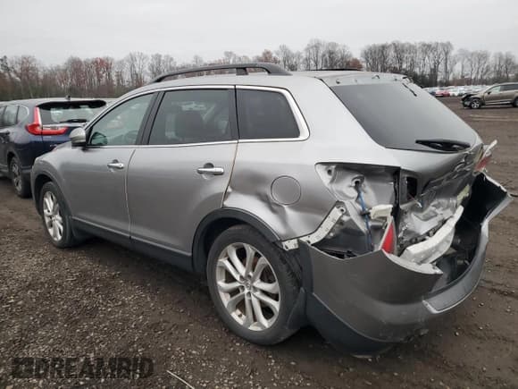 ✅ 2011 Mazda CX-9 Grand Touring • VIN: JM3TB3DV6B0331156 • Лот: 94034625. Опубликован ранее на Copart с пробегом 123 756 миль. Бесплатный доступ к архиву аукционных продаж из США и подробный отчёт об истории автомобиля на DreamBid. Изображение 2.