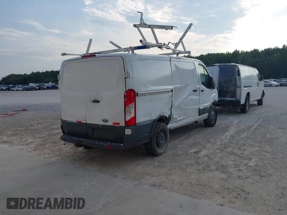 ✅ 2016 Ford Transit Cargo • VIN: 1FTYR1YM1GKB55158 • Lot: 42721028. Listed on IAAI with 86,169 mi. Free auction sales archive from the USA and detailed vehicle history report at DreamBid. Image 4.