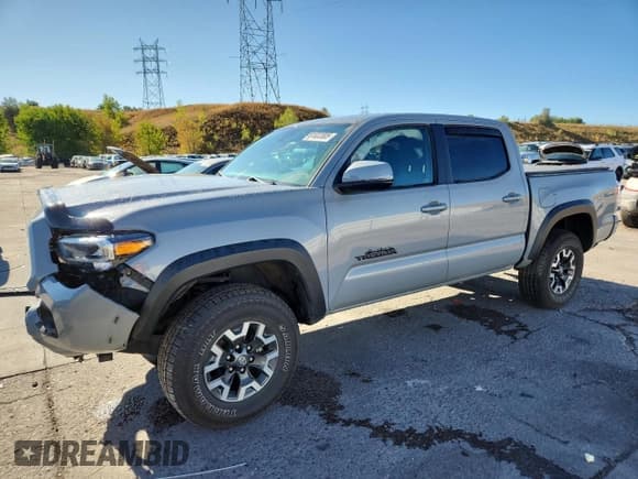 ✅ 2021 Toyota Tacoma TRD Off Road • VIN: 3TMCZ5AN5MM421662 • Лот: 81032005. Опубликован ранее на Copart с пробегом 58 665 миль. Бесплатный доступ к архиву аукционных продаж из США и подробный отчёт об истории автомобиля на DreamBid. Изображение 1.