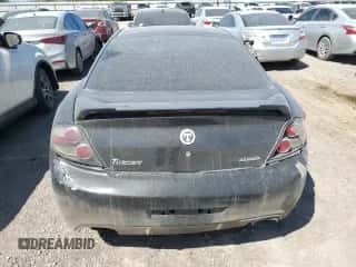 2007 Hyundai Tiburon GS z VIN KMHHM66D27U236507, wystawiony jako Copart lot #41334155 z przebiegiem 97 162 mil mil oraz Szkoda całkowita • Salvage title. Historia ofert i sprzedaży dostępna na DreamBid. Obrazek 6.