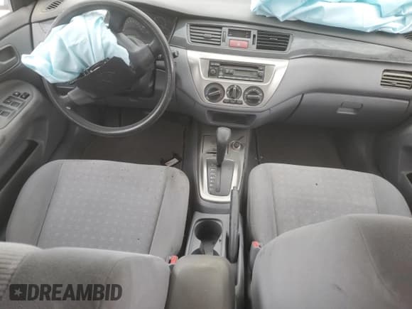 ✅ 2005 Mitsubishi Lancer ES • VIN: JA3AJ26E25U051899 • Lot: 64144255. Wystawiony na Copart z przebiegiem Nie podano. Bezpłatny archiwum sprzedaży aukcyjnych z USA i szczegółowy raport historii pojazdu na DreamBid. Zdjęcie 8.