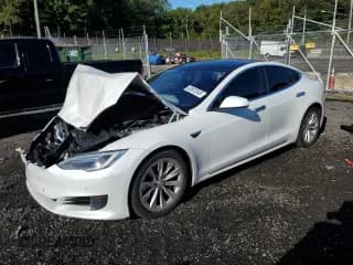 ✅ 2017 Tesla Model S 100D • VIN: 5YJSA1E2XHF209801 • Lot: 83923545. Listed on Copart with 103,279 mi. Free auction sales archive from the USA and detailed vehicle history report at DreamBid. Image 1.